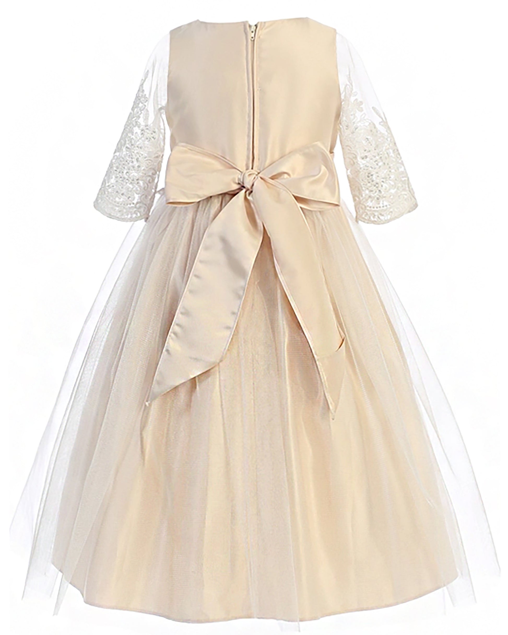 Champagne flower girl dress with lace sleeves and a large bow on a white background