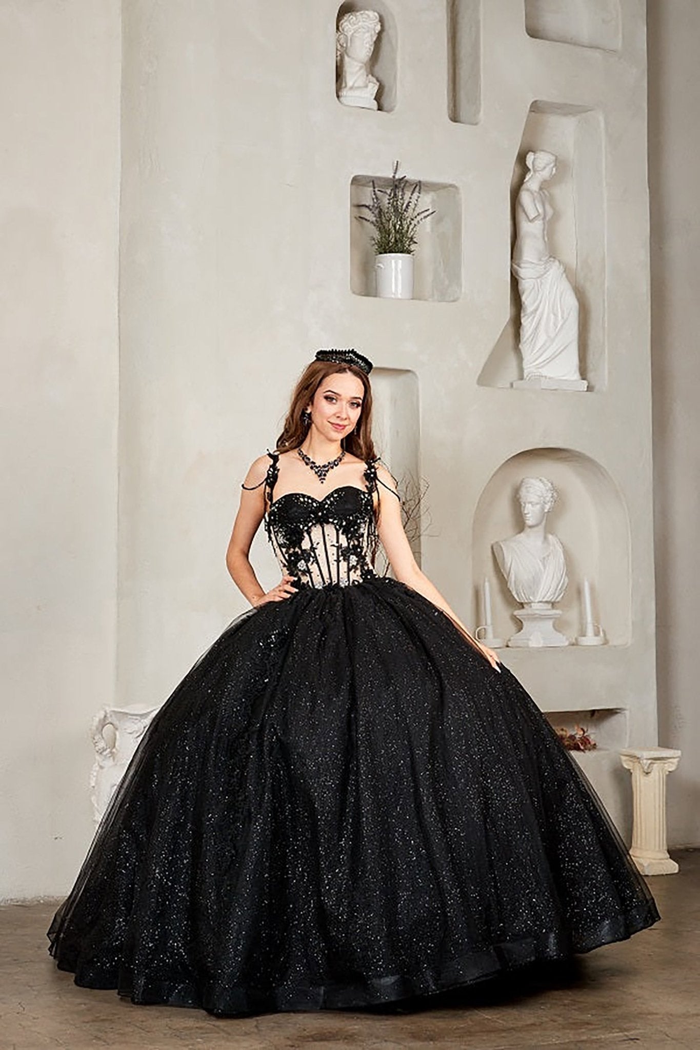 Black quinceañera ball gown with sheer corset bodice, 3D floral embroidery, detachable bow and sparkle tulle