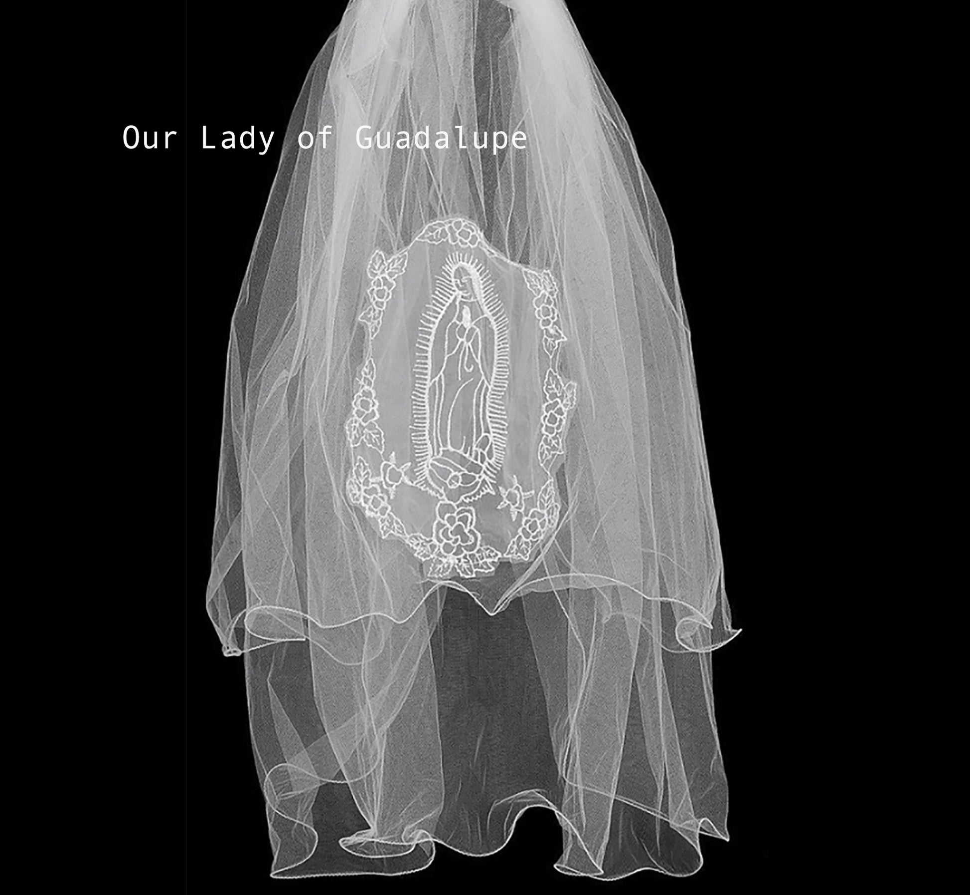 Veil with Our Lady of Guadalupe design on a black background