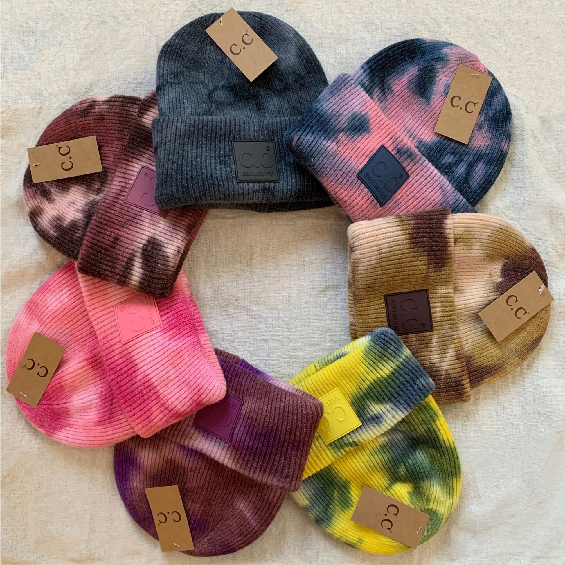 Multi color tie-dye women's winter beanie, color assortment.