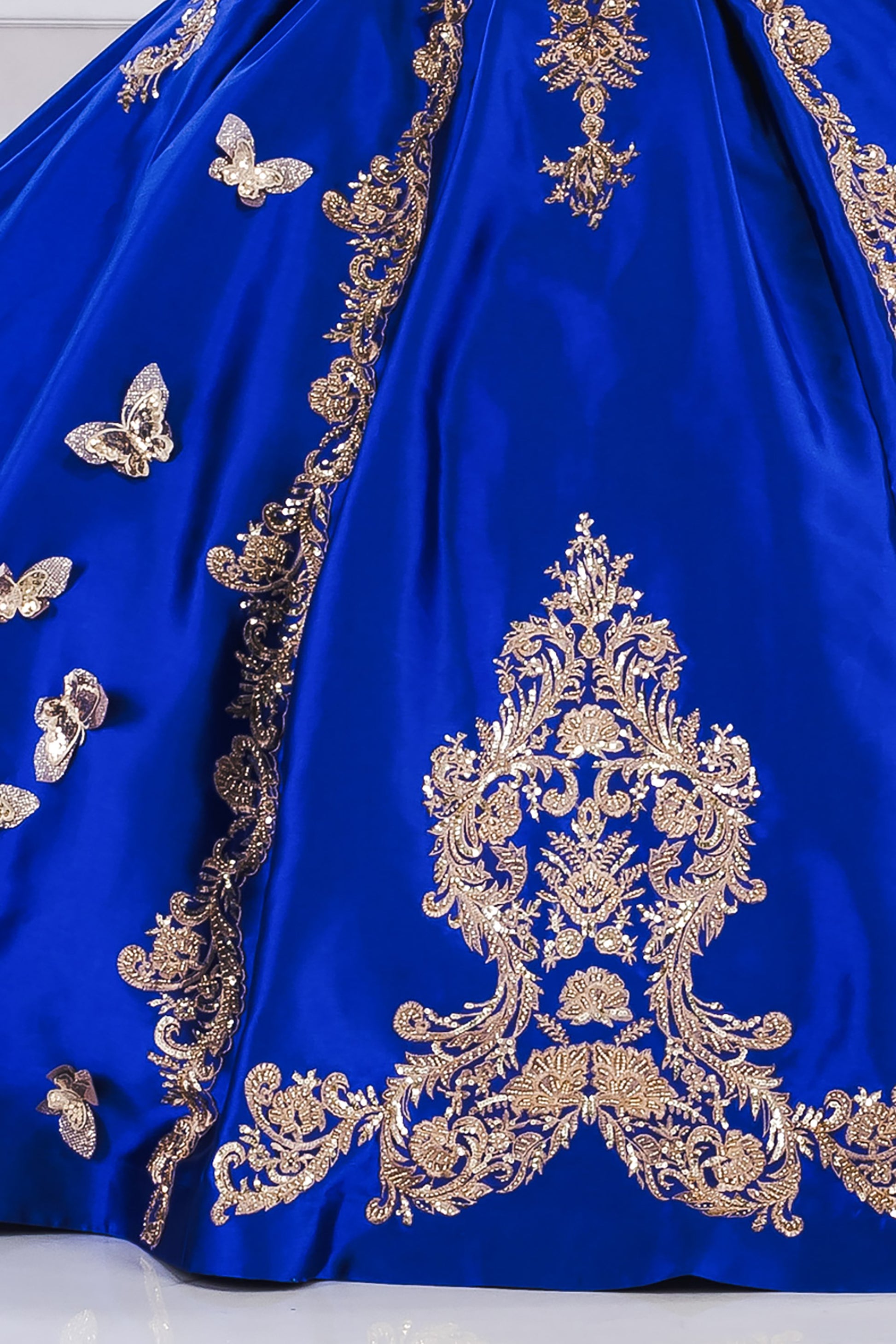 Royal Blue Gold Butterfly Accented Quince dress with Removable Pouf Arm Cuffs skirt pattern view