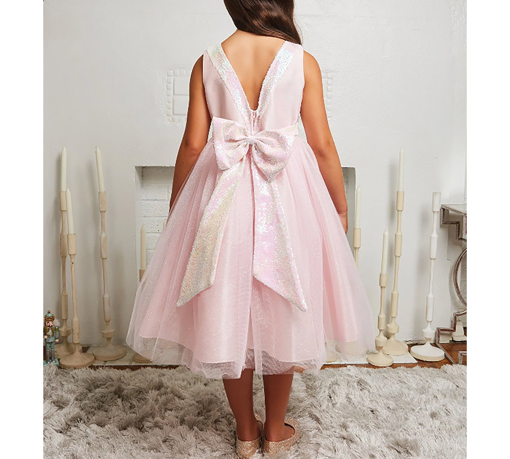 Blush USA Made | Sequin V-Back Tulle Flower Girl Dress with detachable Ribbon pin - back view of girl wearing dress