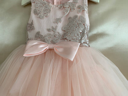 Blush USA Made | Embroidered Sequined Top with Gorgeous multiple tiered skirt - zoomed in front view of dress and bow