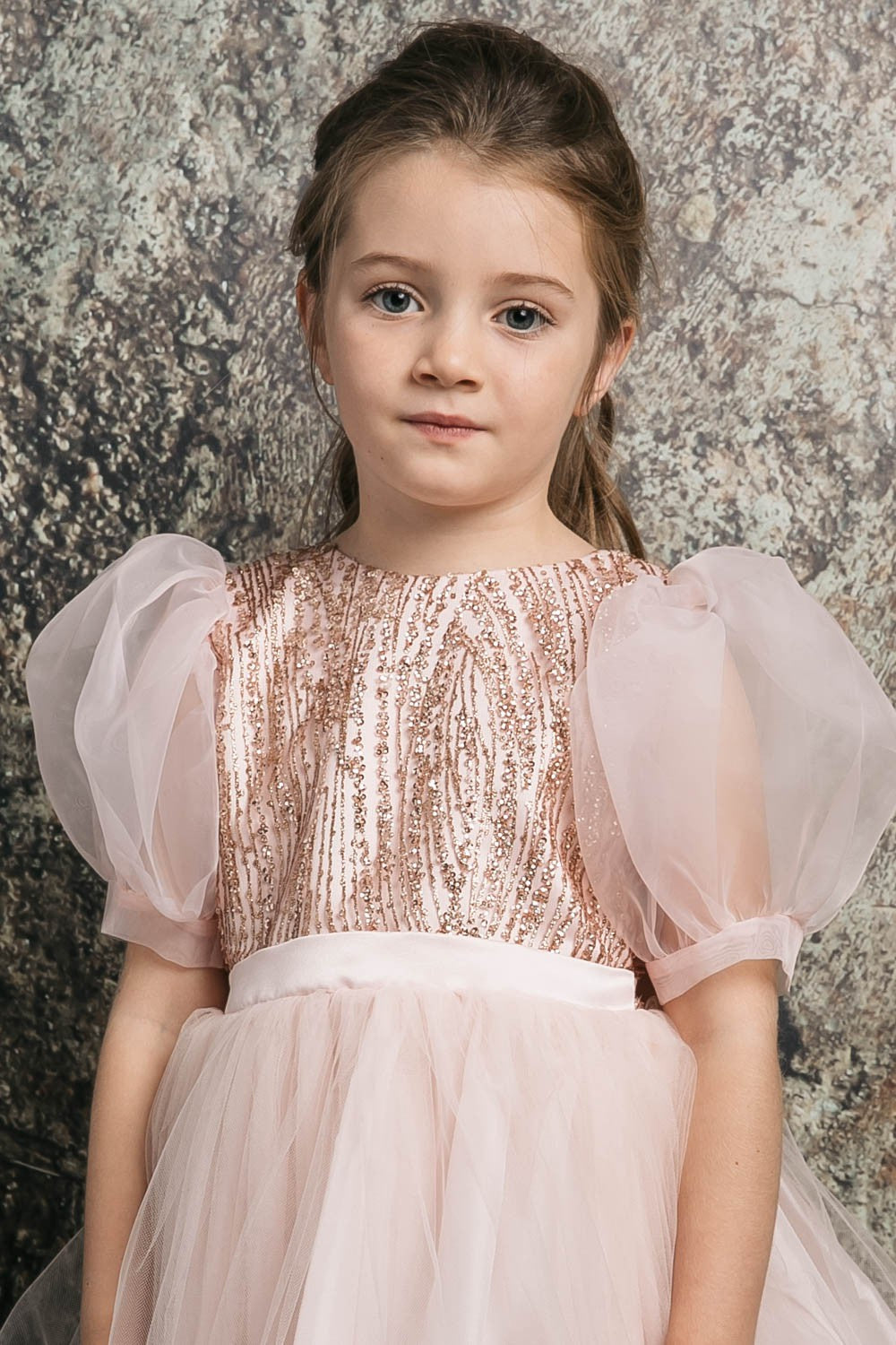 Blush USA Made | Glittering Sequin bodice Luxurious Tulle with Organza Bubble Sleeve Tea-length dress - zoomed in front view of girl wearing dress looking at camera with arms at sides