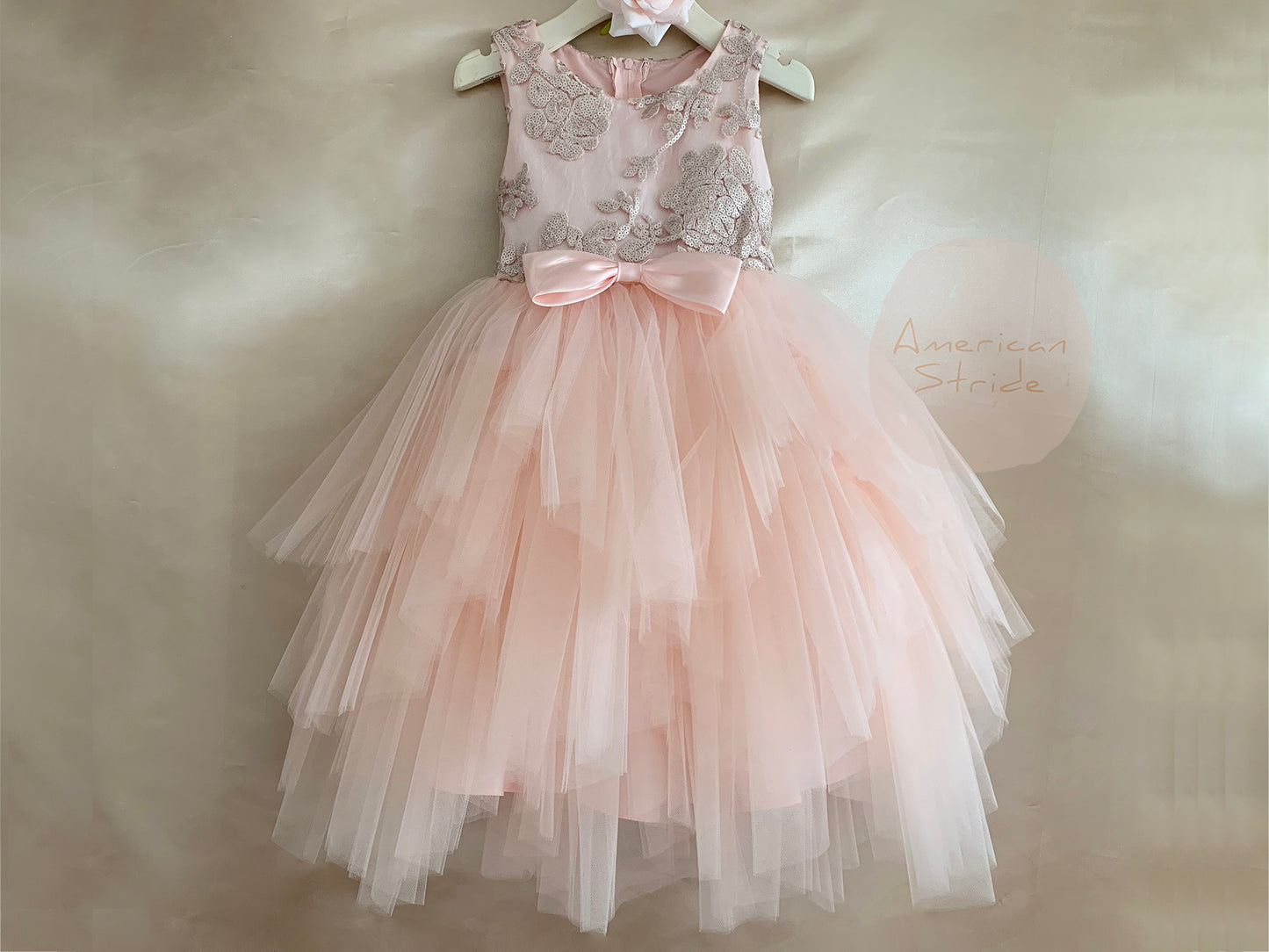 Blush USA Made | Embroidered Sequined Top with Gorgeous multiple tiered skirt - front view of dress on hanger