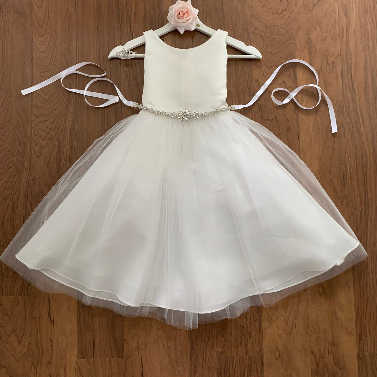Silver rhinestone floral flower girl sash belt, front view.