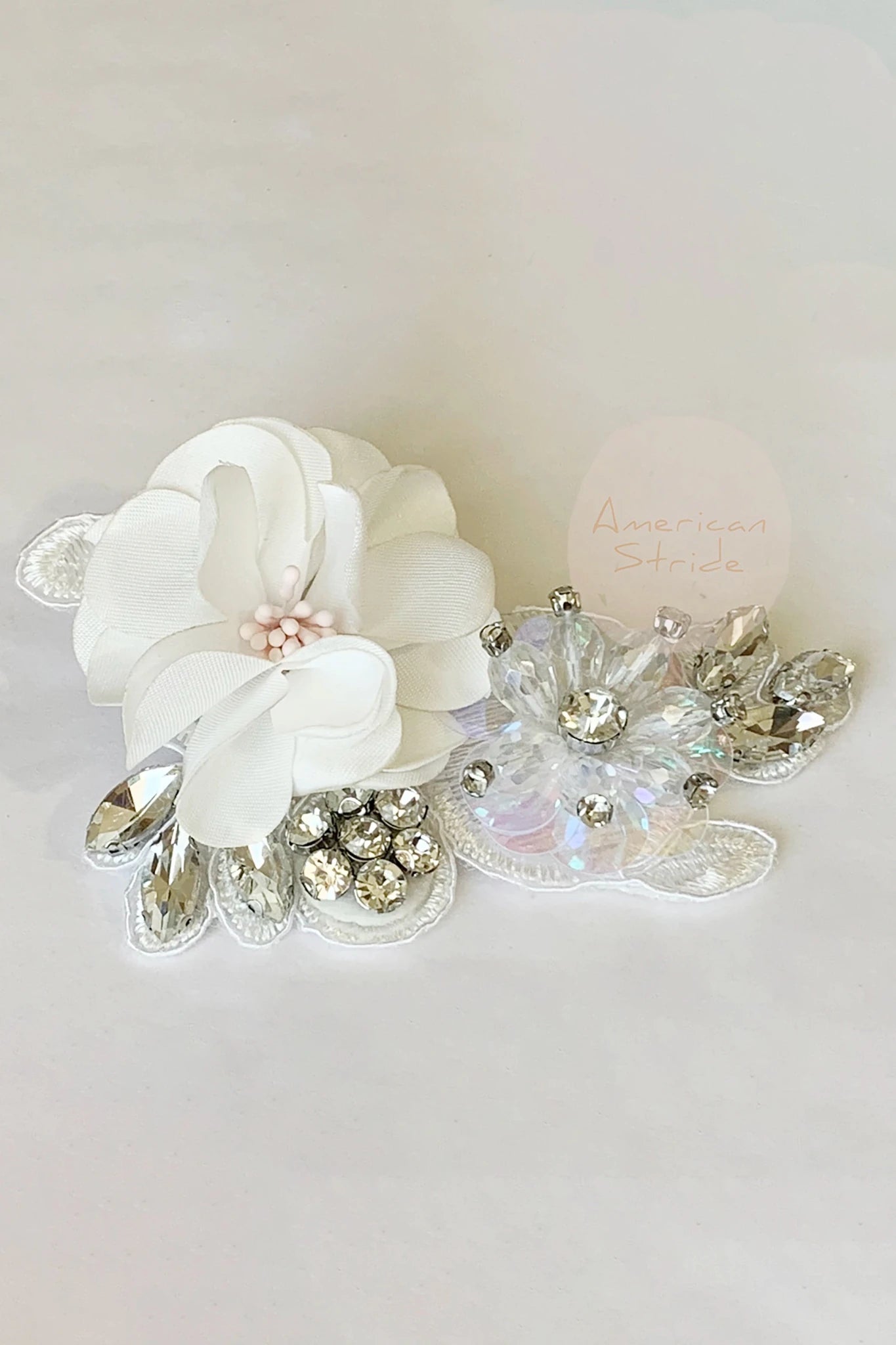 Off white rhinestone floral flower girl hair clip.