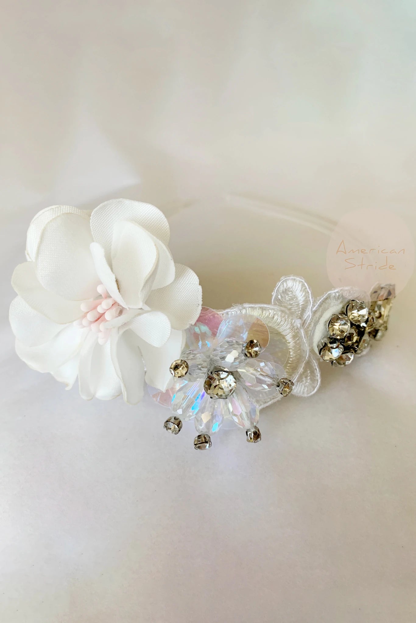 White rhinestone floral flower girl headband.
