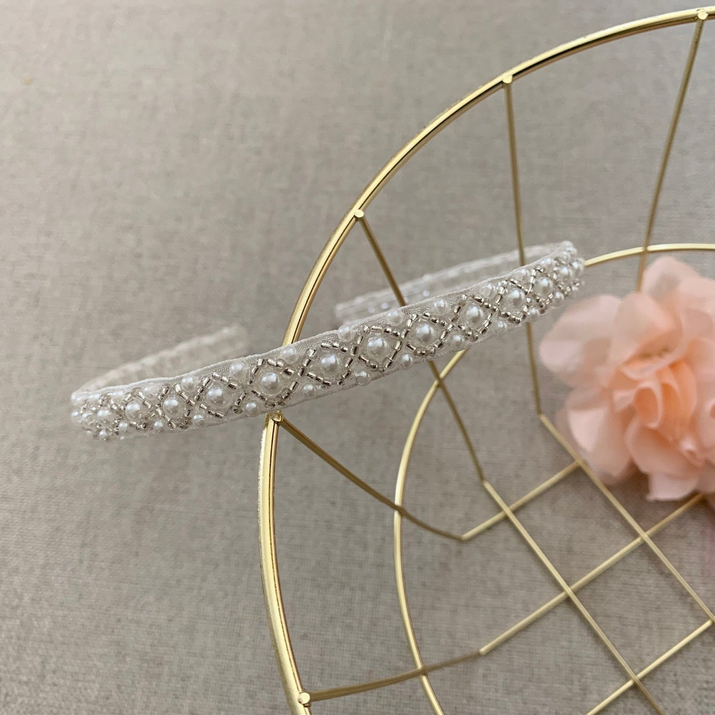 Ivory pearl flower girl headband, close-up, embellishment detail.