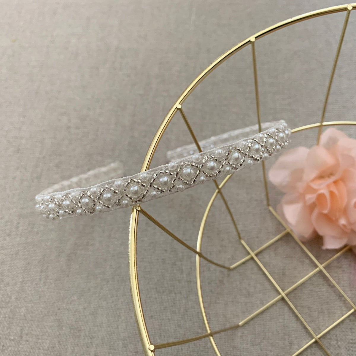 Ivory pearl flower girl headband, close-up, embellishment detail.