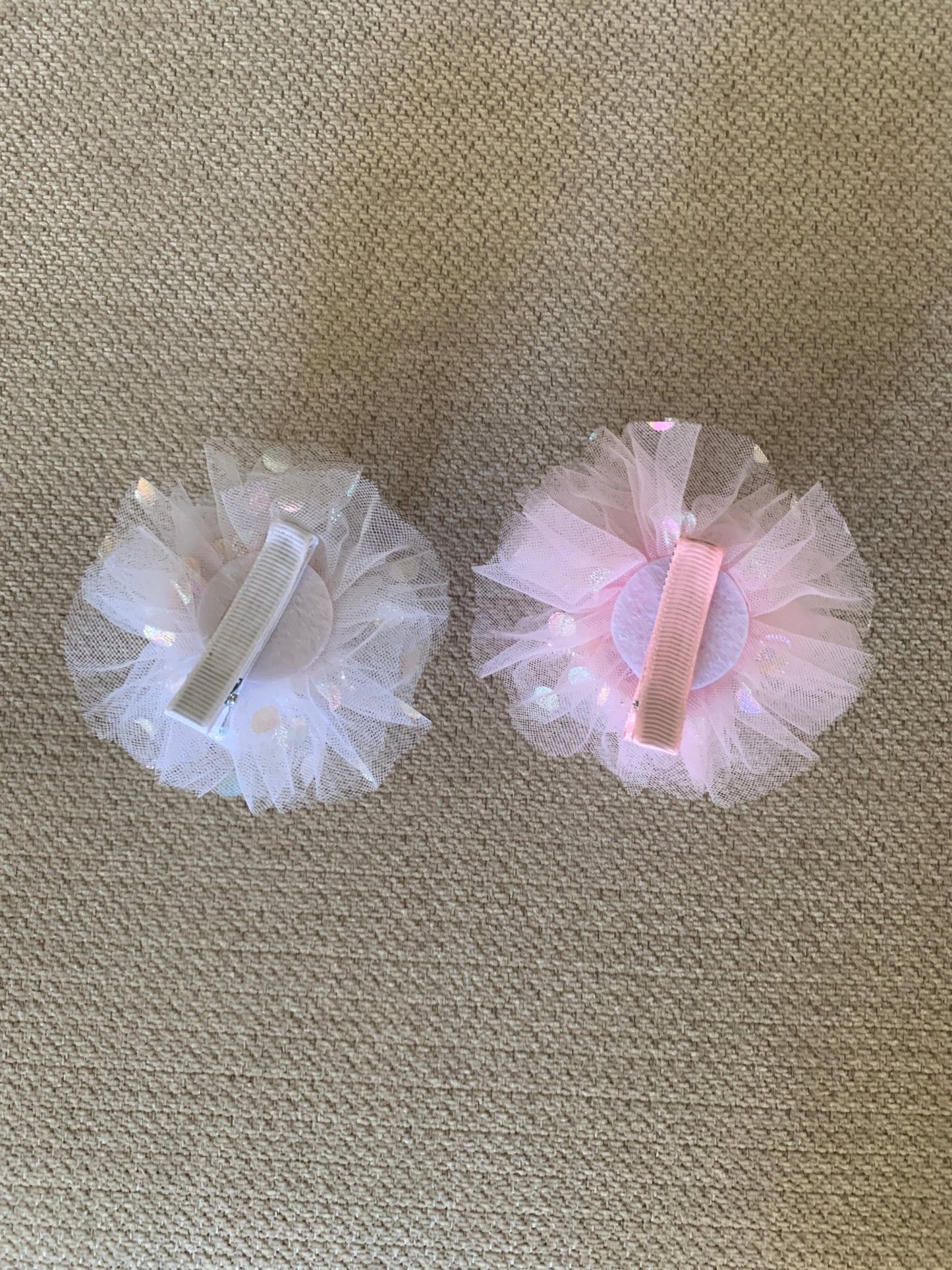 White and pink rhinestone tulle flower girl tulle crown pin, back view.