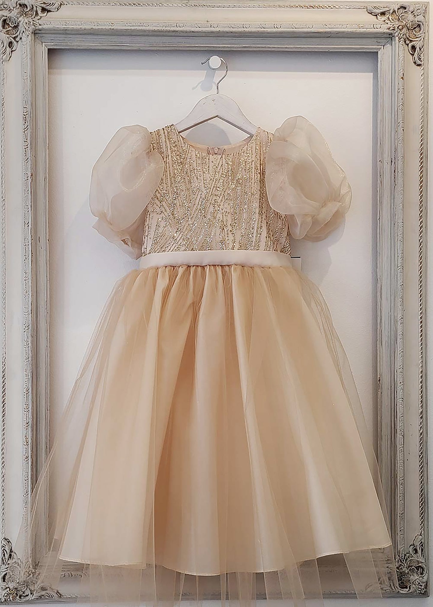 Champagne USA Made | Glittering Sequin bodice Luxurious Tulle with Organza Bubble Sleeve Tea-length dress - front view of dress on hanger