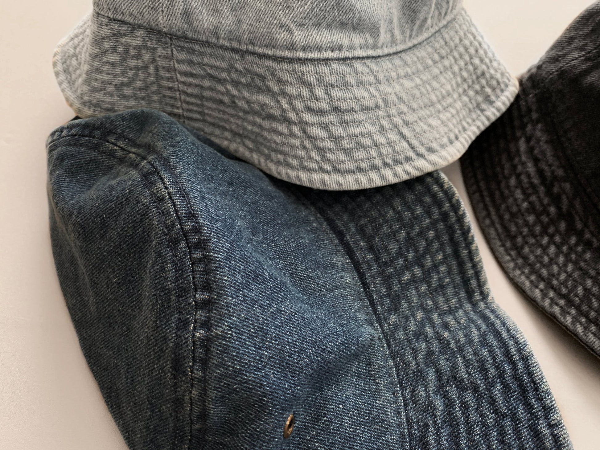 Denim everyday women's bucket hat, side view.