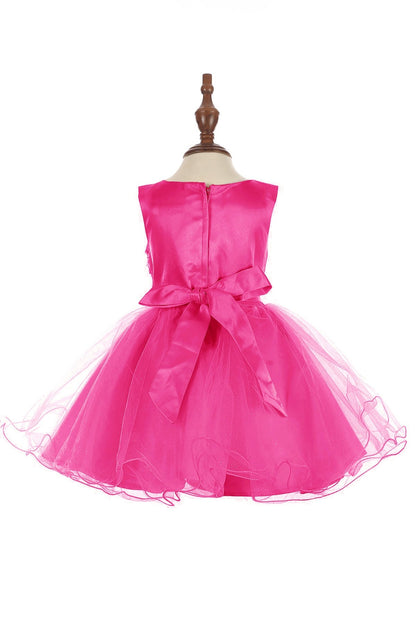 fuchsia baby dress on a mannequin against a white background