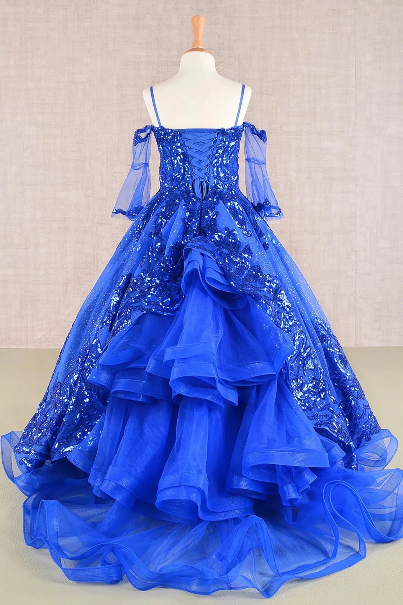 Royal blue kids mini quinceañera mini quince dress featuring a glitter sequin mesh bodice, sparkling tulle skirt, and detachable three-quarter sleeves.