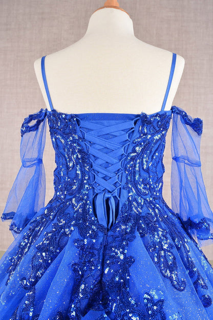 Detailed view highlights blue Royal Blue Kids Dress with Glitter Sequin Mesh and Detachable Sleeves, Mini Quince Dress.