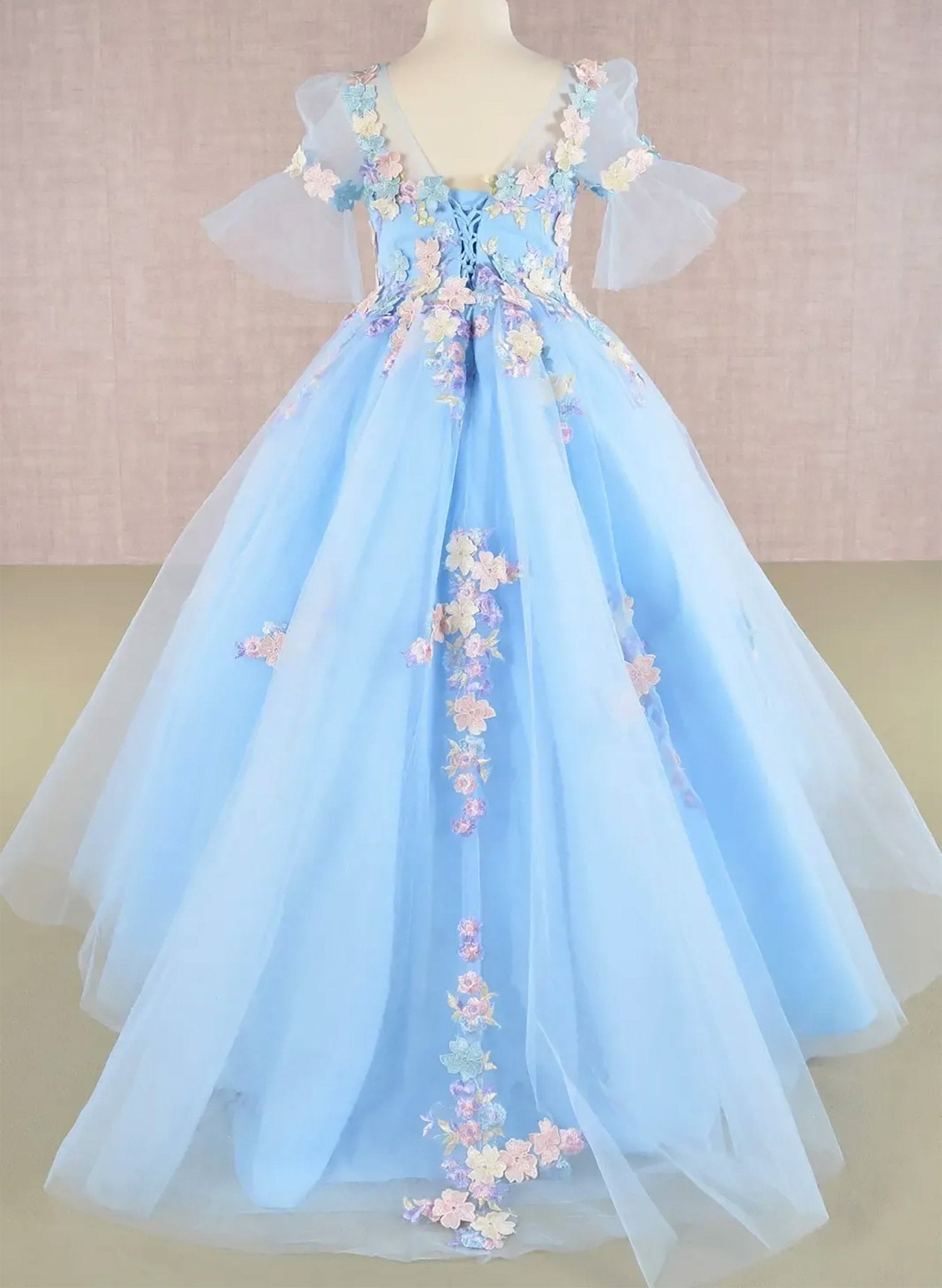 Back baby blue kid ballgown with 3D floral applique, puff sleeves, and long back hem