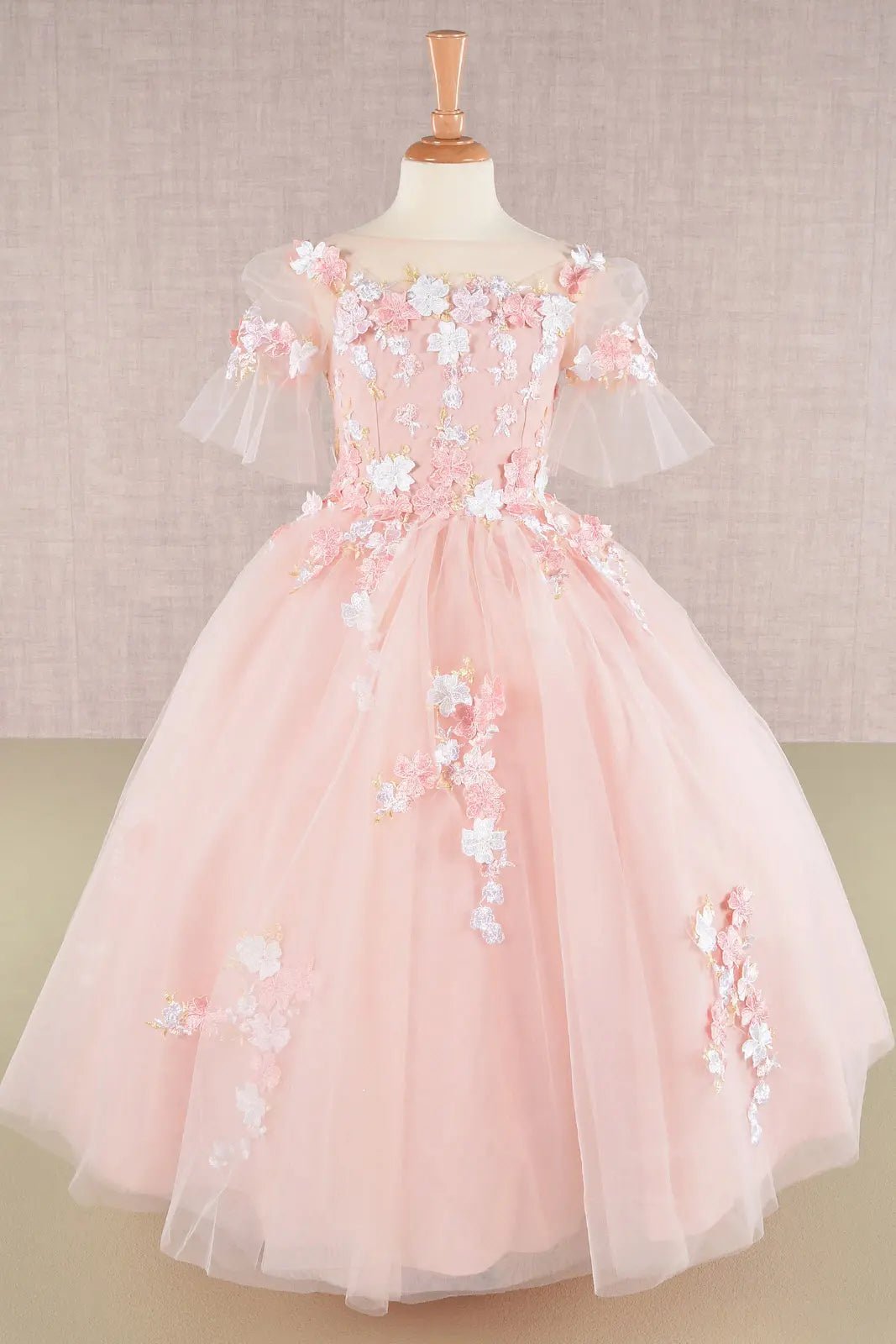 Blush kids mini quinceañera dress with 3D floral applique bodice, puff sleeves, and glitter tulle layered skirt