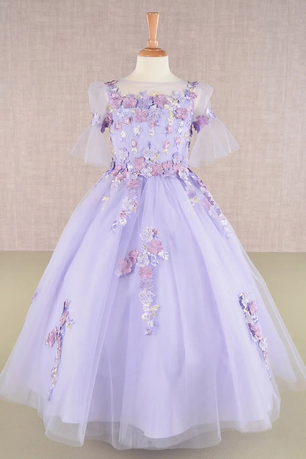 Lilac kids mini quinceañera dress with 3D floral applique bodice, puff sleeves, and glitter tulle layered skirt