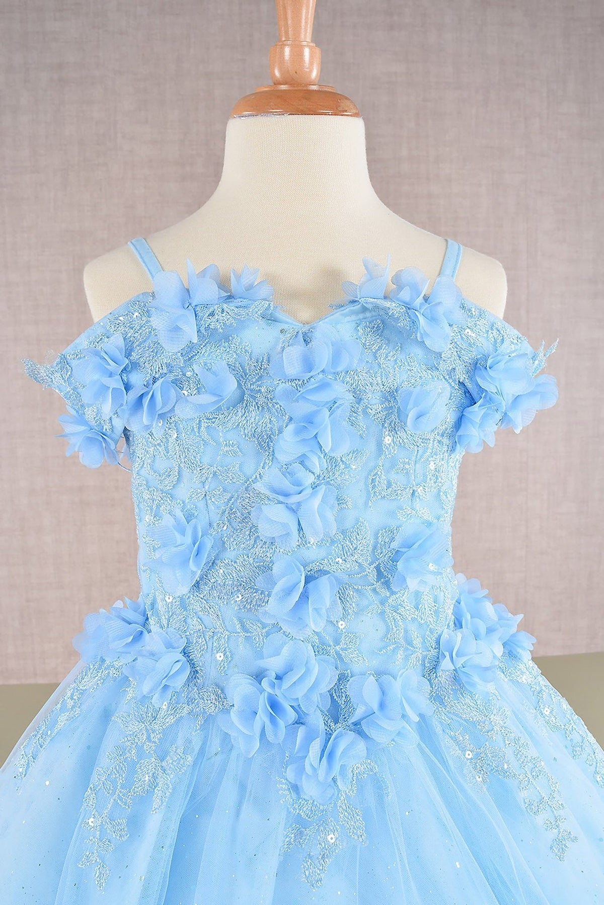 Close-up of blue Baby Blue Kids Dress with 3D Floral Applique and Glitter Embroidery Mesh, Mini Quince Dress.