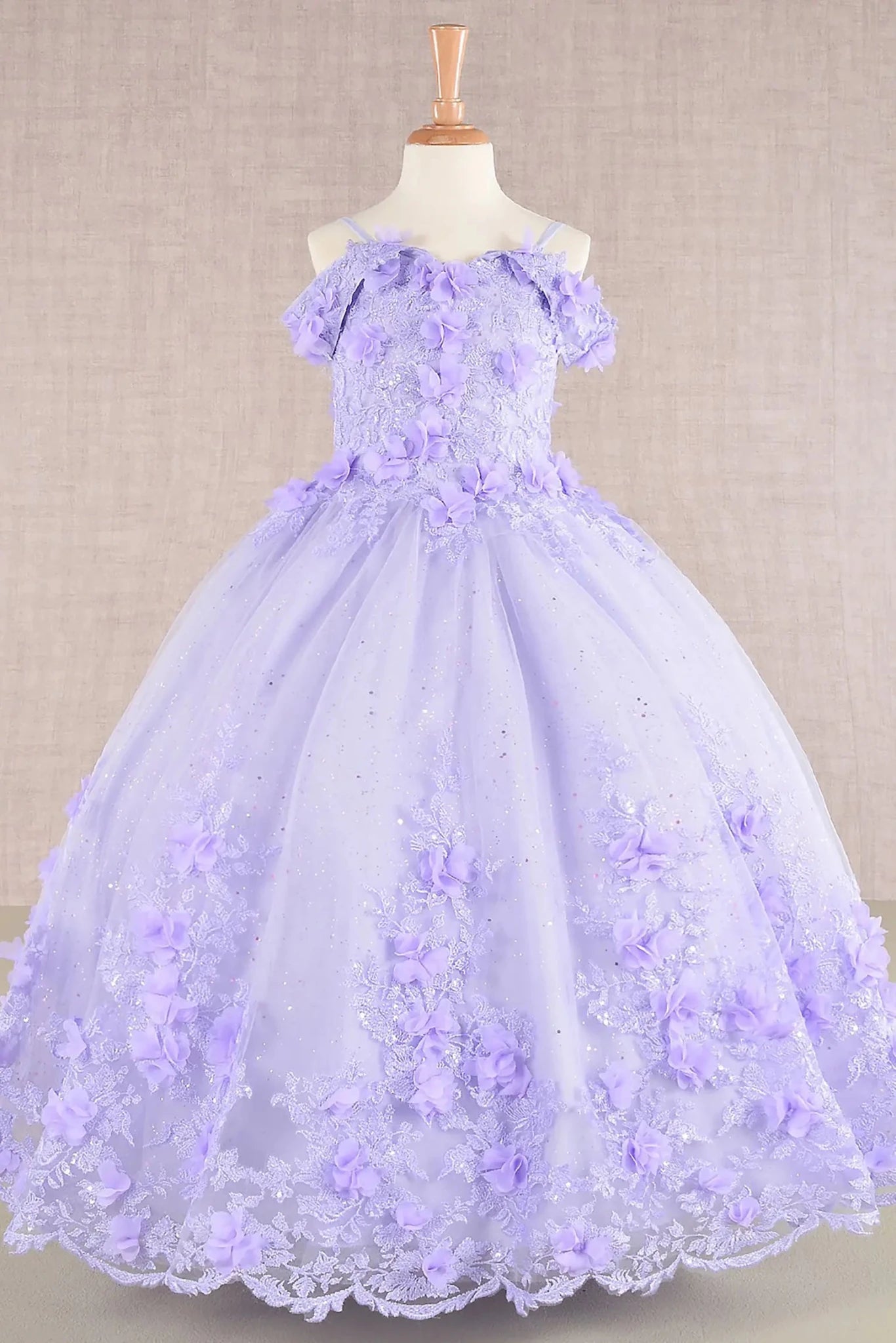Lilac kids mini quinceañera mini quince dress featuring a 3D floral applique bodice and glitter embroidery mesh layered skirt.