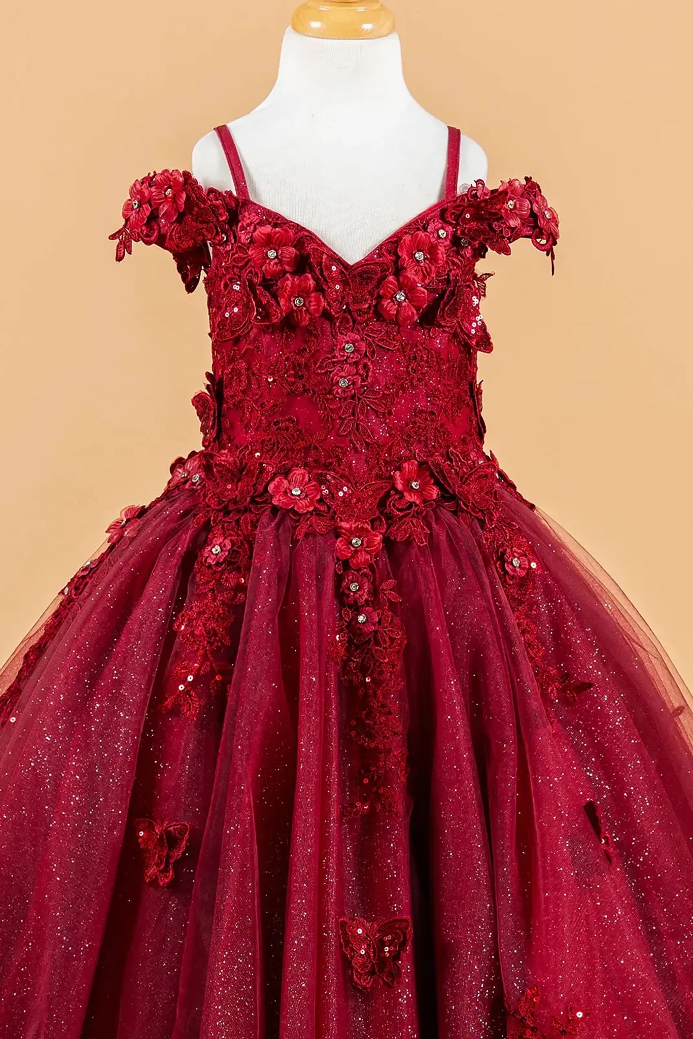 Red kids floral mini quince dress displayed.
