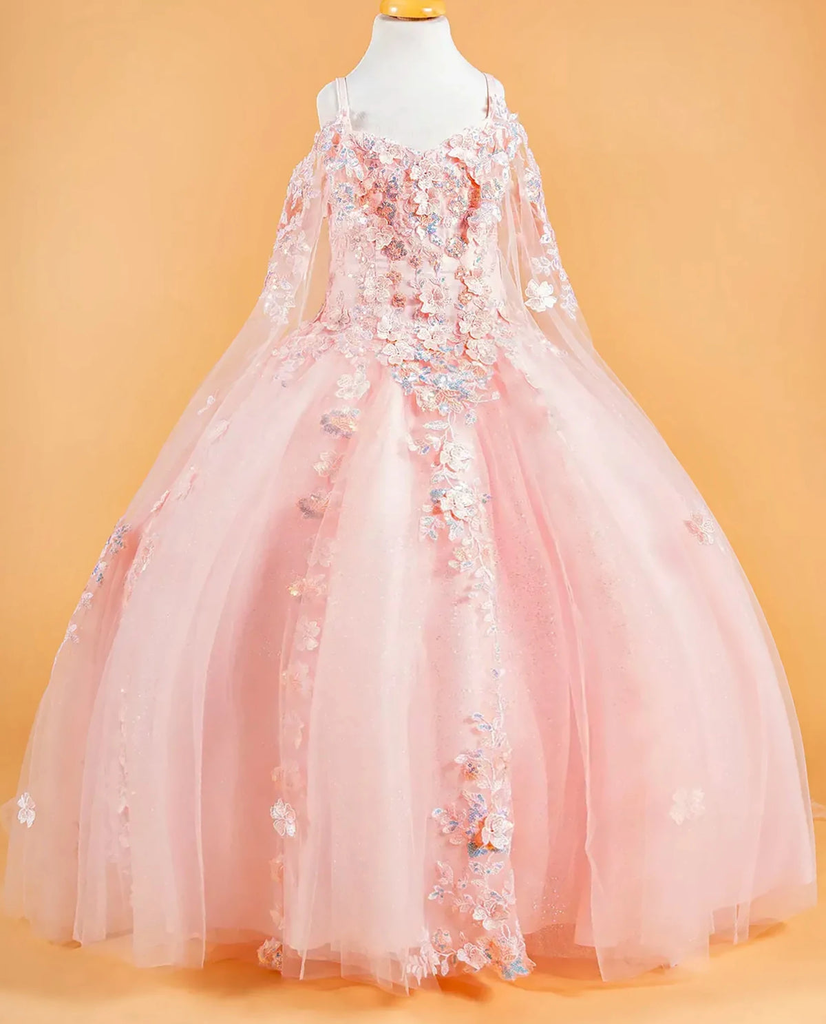 Blush kids floral mini quince dress displayed.