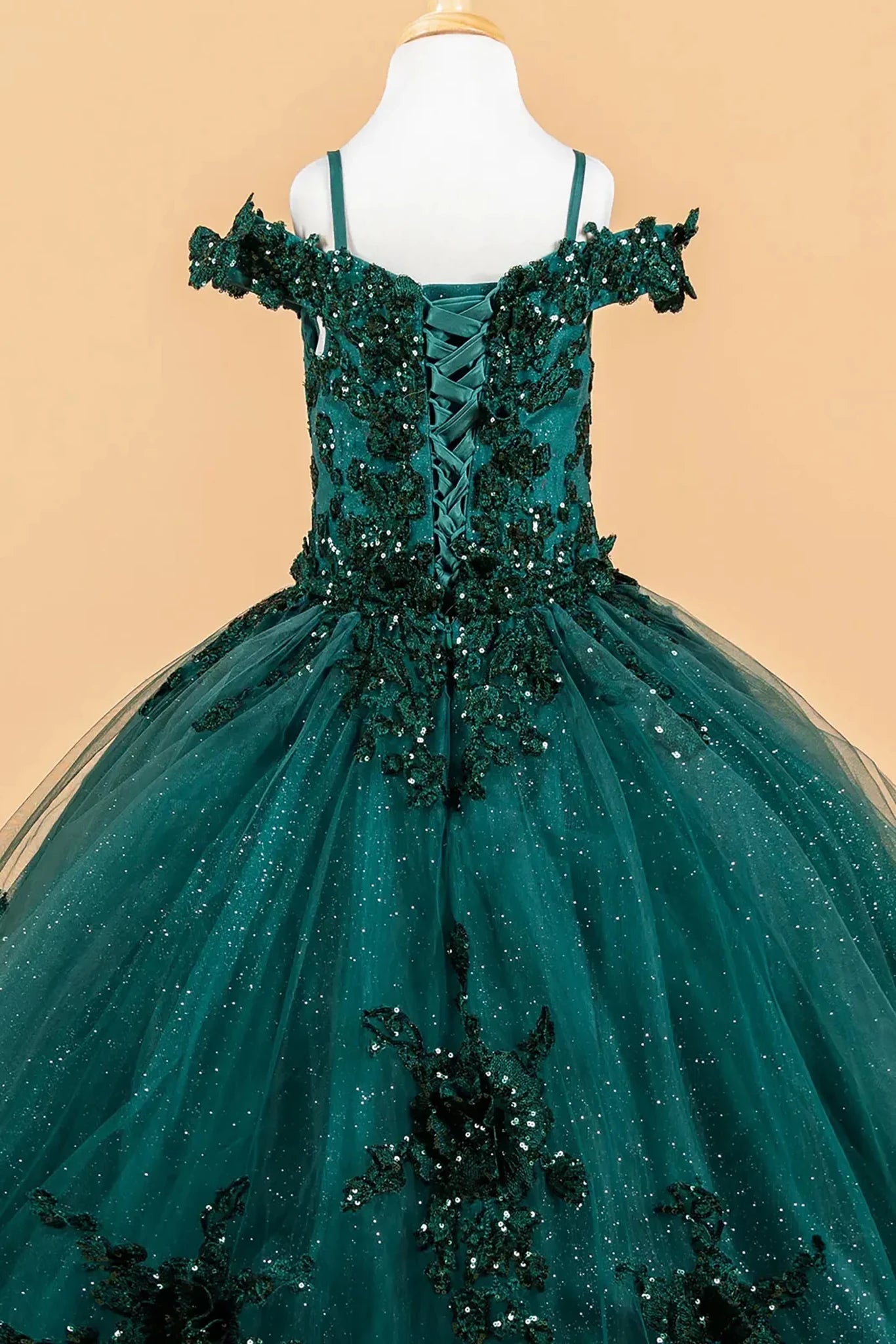 Green kids evening mini quince dress with embellished details.