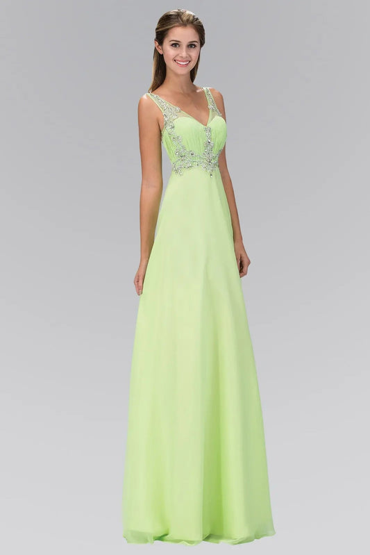 Full-length view highlights light Green beading embellished formal dress.