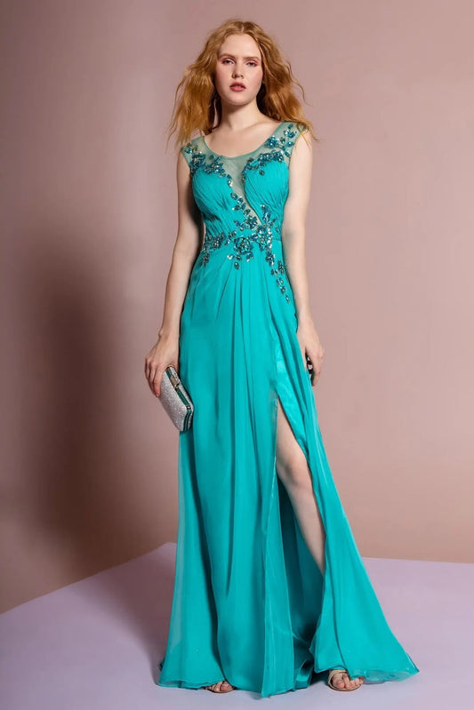 Full-length view highlights aqua beading embellished pleated formal dress.