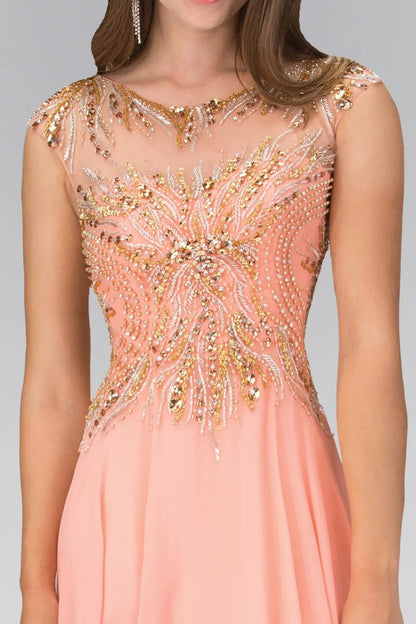 Full-length view highlights coral beading formal dress.