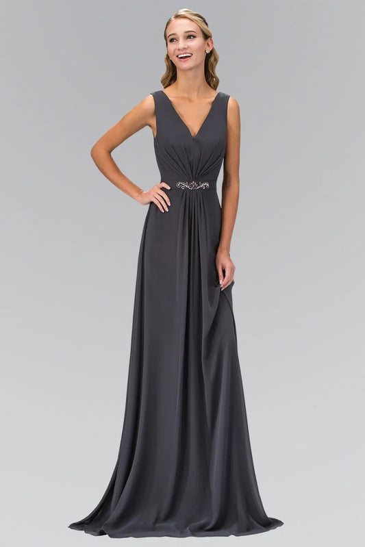 Full-length view highlights charcoal embellished formal dress.