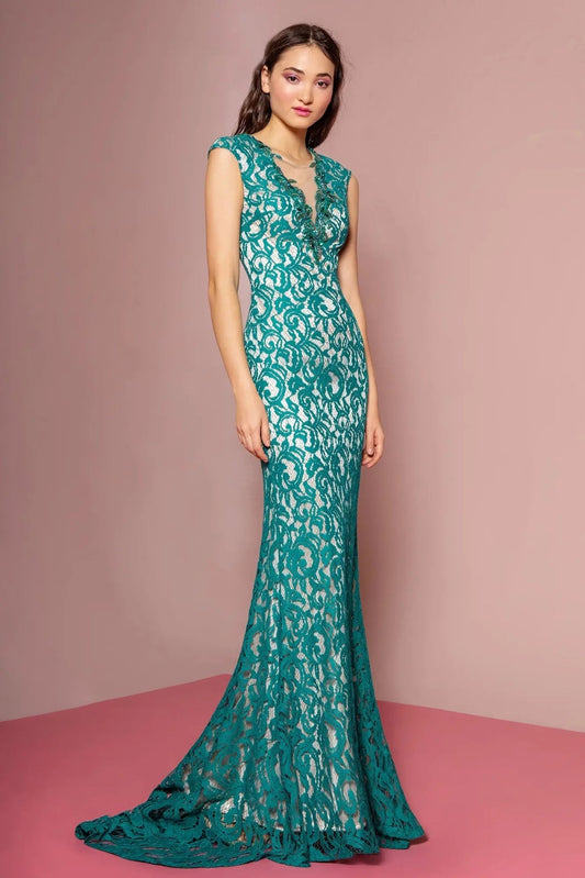 Bodice close-up highlights teal/Nude beading formal dress.