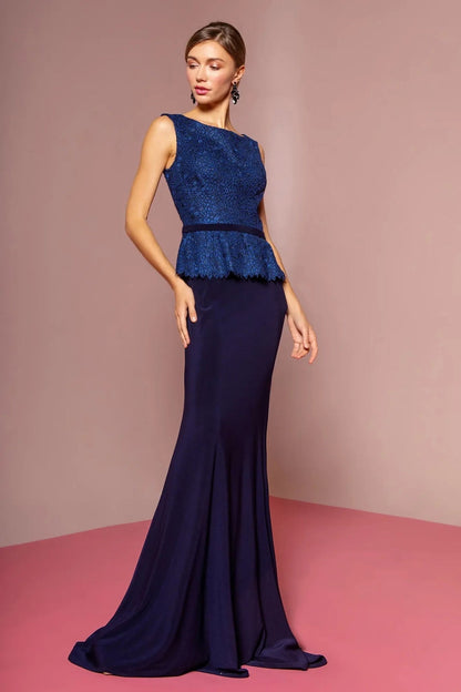 Full-length view highlights navy jersey, lace formal dress.