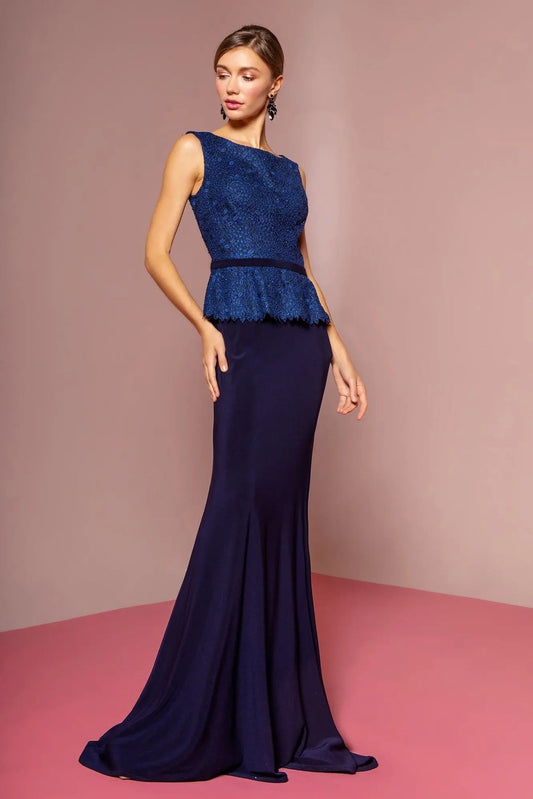 Full-length view highlights navy jersey, lace formal dress.