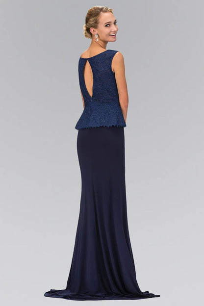 Rear view reveals navy jersey, lace formal dress.