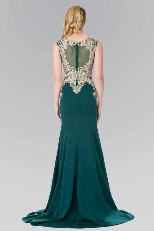 Rear view reveals green embellished embroidery formal dress.