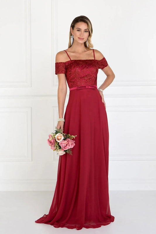 Rear view reveals burgundy embellished formal dress.
