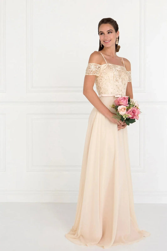 Bodice close-up highlights champagne embellished formal dress.