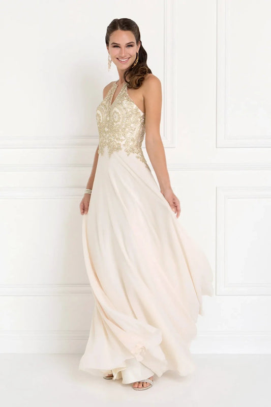 Full-length view highlights champagne embellished embroidery formal dress.