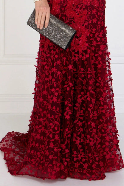 Intricate features stand out across burgundy embellished 3d detail formal dress detail.