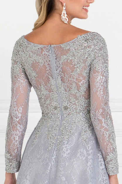 Rear view reveals silver embellished formal dress.