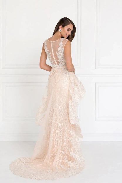 Bodice close-up highlights champagne beading embellished formal dress.