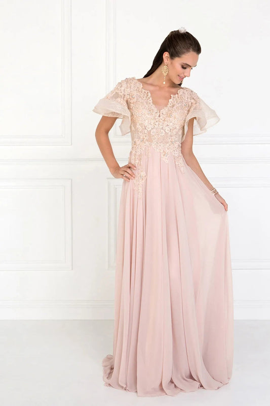 Rear view reveals champagne beading embellished ruffles formal dress.