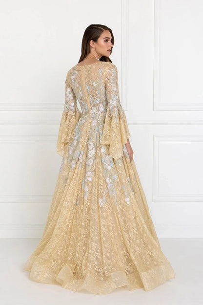 Back detail shows champagne embellished embroidery floral formal dress back bodice detail.