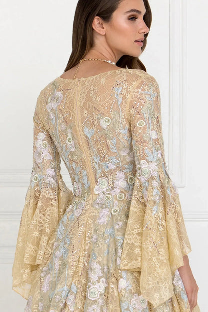 Bodice close-up highlights champagne embellished embroidery floral formal dress.