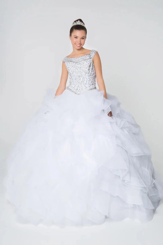 Sweeping White quinceañera ball gown is shown in full with a silver jeweled bodice and bright white ruffled skirt.