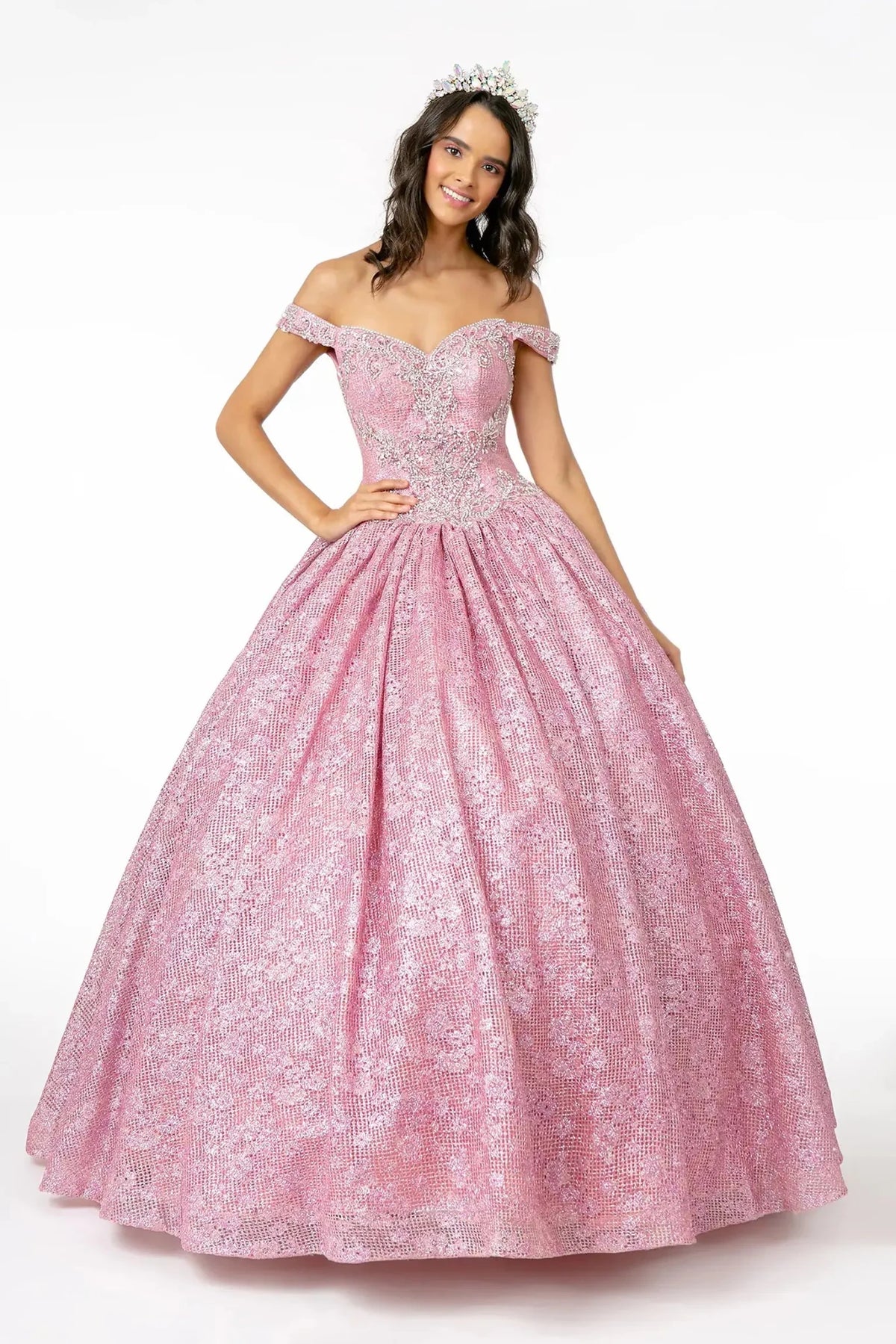 Full-length Pink quinceañera ball gown showcases a glitter-net off-shoulder bodice and patterned ball skirt.