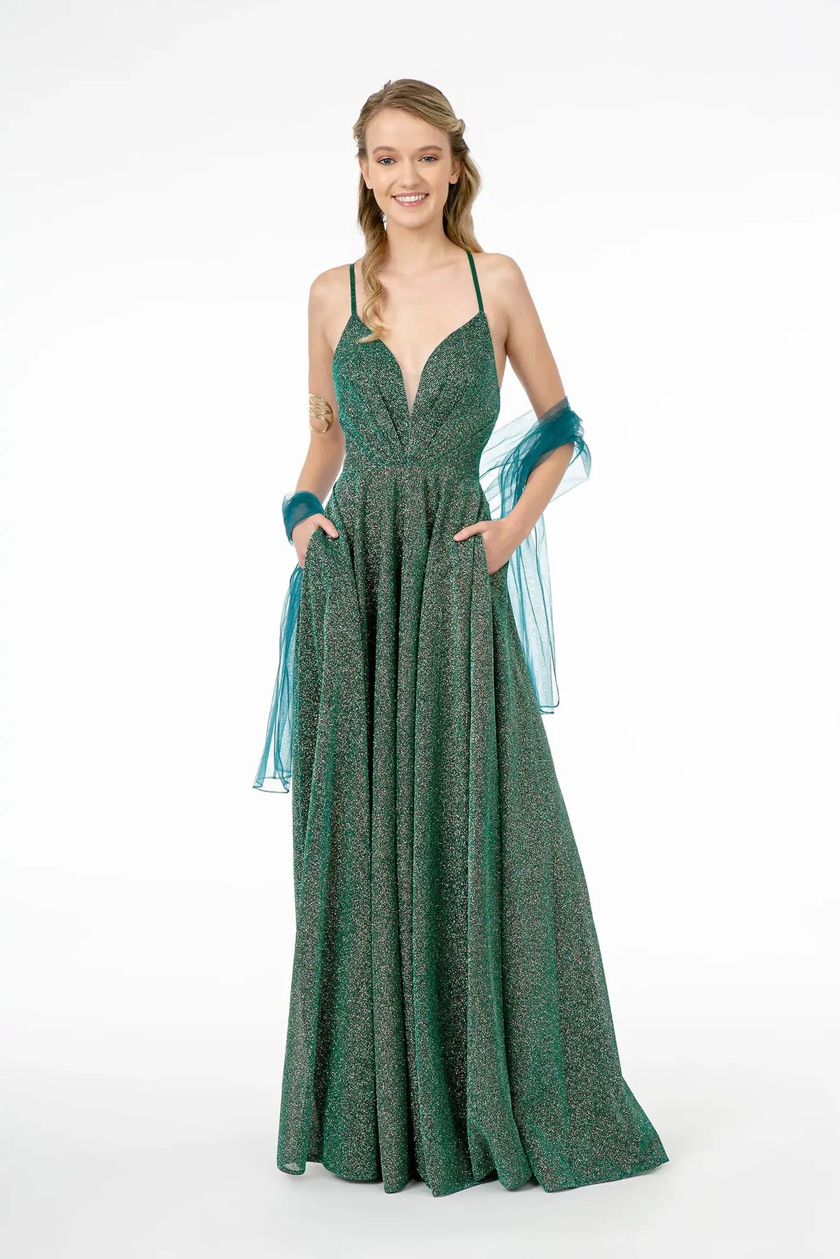 Green mother of the bride dress with a flowing glitter A-line skirt