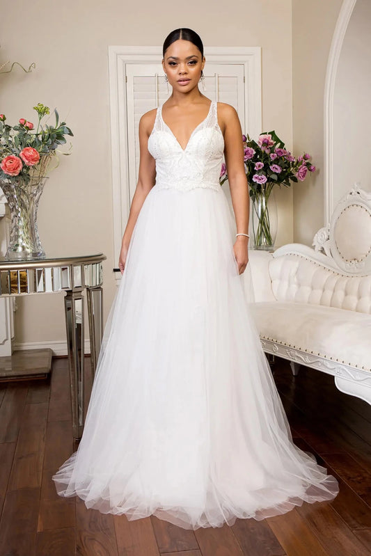 Ivory wedding gown with a beaded V-neck bodice and sweeping A-line skirt.